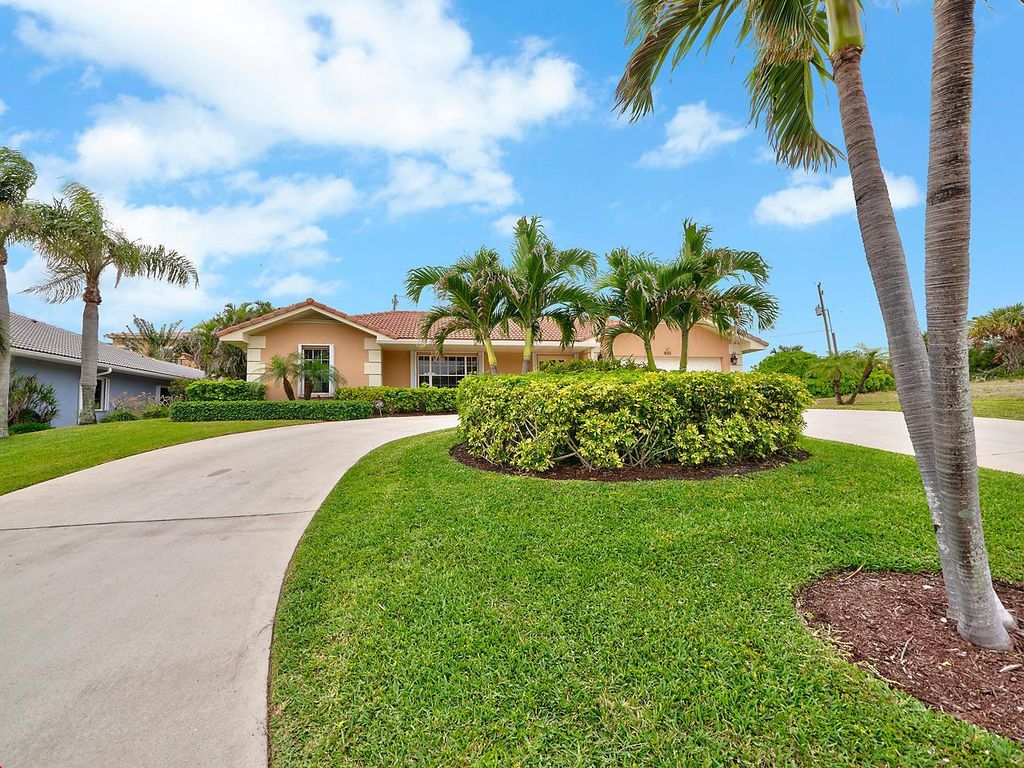 Photo of 400 S Lyra Circle, Juno Beach, FL 33408 (MLS # R11091432)