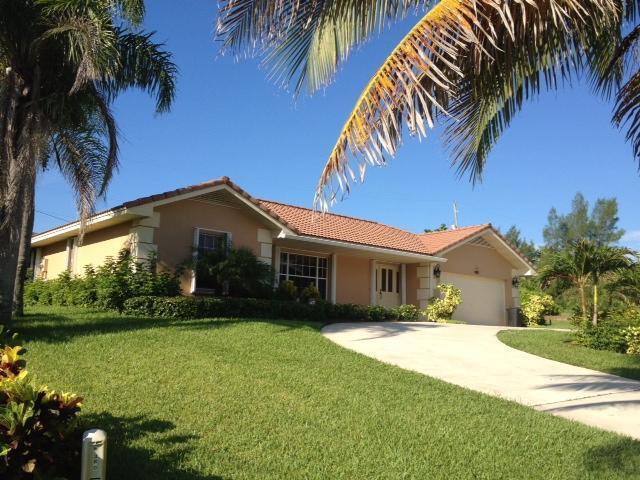 Ocean access just steps away! Prime location. near the walkway to the sand. Look forward to sunrises over the ocean each day. Well maintained nicely furnished home with split floor plan offered for your seasonal getaway. Large outdoor living space to enjoy ocean breezes. Walk to Pelican lake and nearby restaurants.