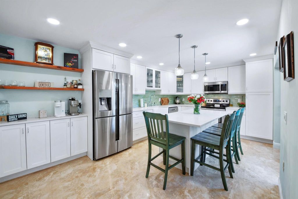 Photo of 311 Buttonwood Lane, Boynton Beach, FL 33436 (MLS # R11107397)