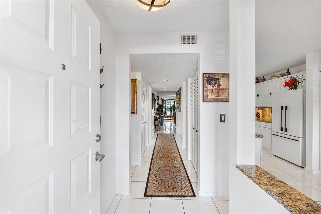 Photo of 7219 Fairfax Dr #110, Tamarac, FL 33321 (MLS # F10516416)