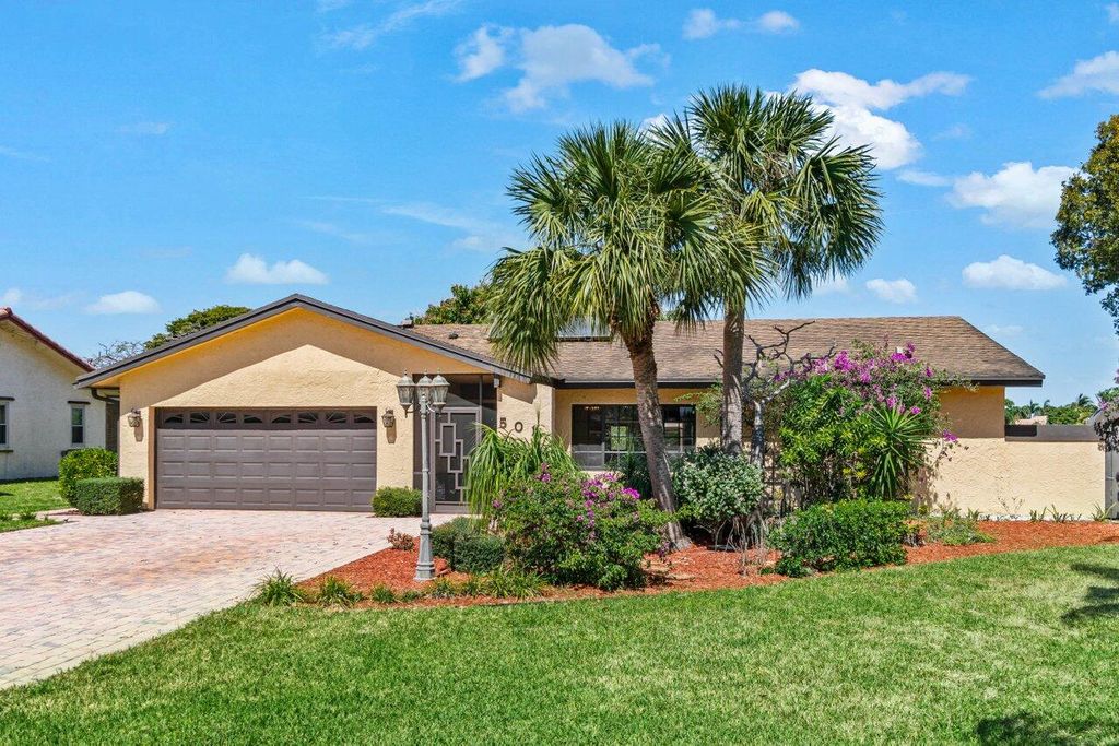 Photo of 501 NW 55th Terrace, Boca Raton, FL 33487 (MLS # R11070876)