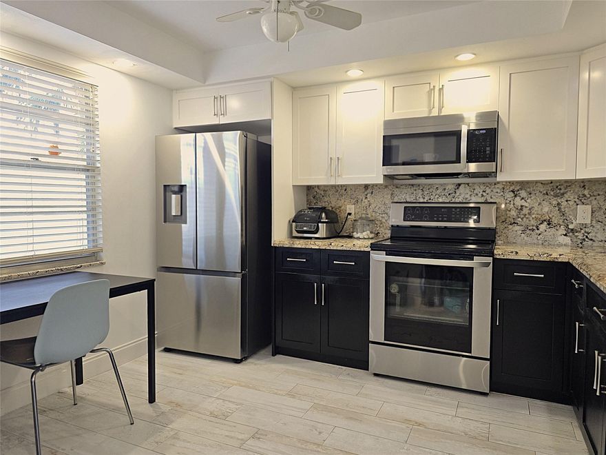 2/2  LUXURY MODEL IN PRESTIGIOUS ARUBA VILLAGE! BLDG HAS NO ASSESSMENTS, GREAT FINANCIALS &  NEW ROOF! ELEGANT 2 TONE OPEN KITCHEN W/ TIMELESS STONE COUNTERTOPS & BACKSPLASH W/ SS APPLIANCES. NEWER A/C & WATERHEATER! LOVELY WIDE PLANK LAMINATE FLOORS THROUGHOUT. THE UNIT HAS NEUTRAL COLORS & IS TASTEFULLY FURNISHED. BOTH BATHROOMS ARE SPOTLESS! *PRIDE OF OWNERSHIP*. FRONT LOAD WASHER/DRYER INSIDE FOR YOUR CONVIENENCE. WYNMOOR FEATURES AN ACTIVE CLUBHOUSE WITH CLUBS & CLASSES GALORE! ENJOY PICKLEBALL, TENNIS, BILLIARDS, BOCCE BALL, SWIMMING, DANCE VENUES, KARAOKE, THEATRE, FITNESS CENTER & AN 18 HOLE EXECUTIVE GOLF COURSE! SHUTTLE BUSES ARE AVAILABLE AT YOUR BECK AND CALL. CLOSE TO ALL MAJOR HWYS, GREAT SHOPPING & EATERIES! 20 MINS TO THE OCEAN! THE BEST TIME TO BUY IS NOW$$$.