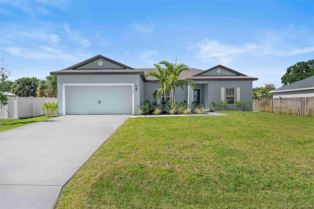 Photo of 1574 SW Leisure Lane, Port Saint Lucie, FL 34953 (MLS # F10476099)