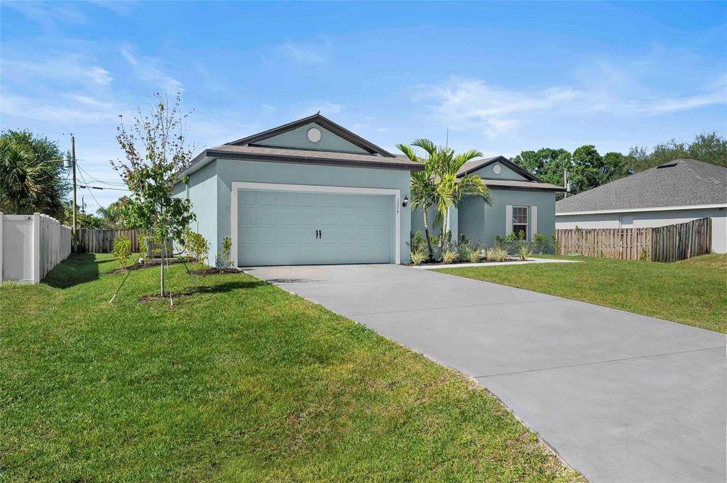 Photo of 1574 SW Leisure Lane, Port Saint Lucie, FL 34953 (MLS # F10476099)