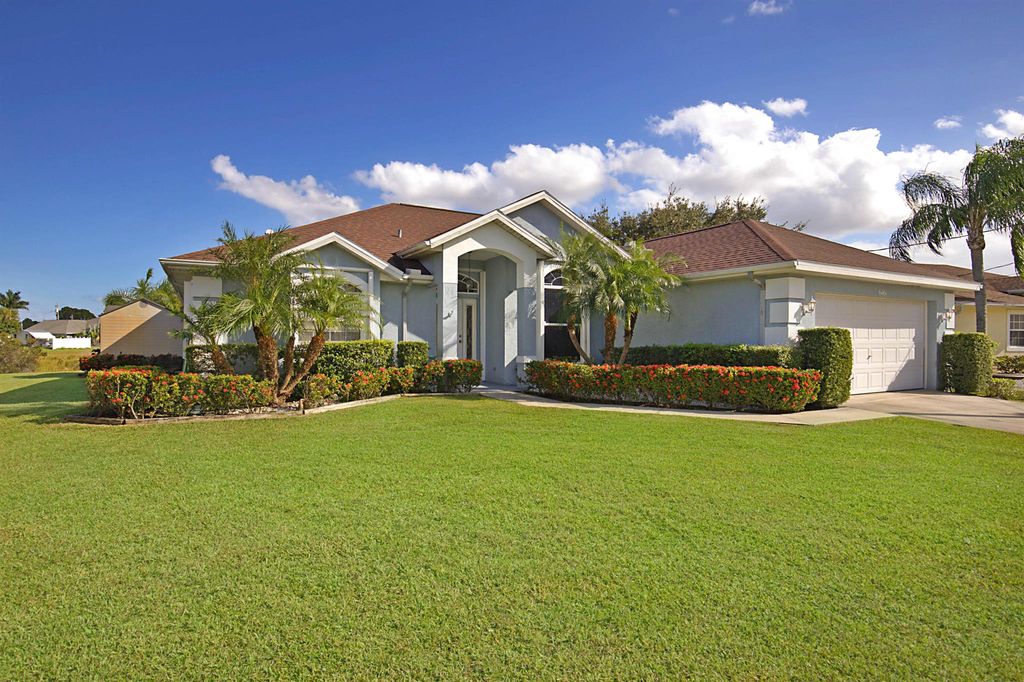 Photo of 6461 NW Fagan St, Port St Lucie, FL 34986 (MLS # R10925702)