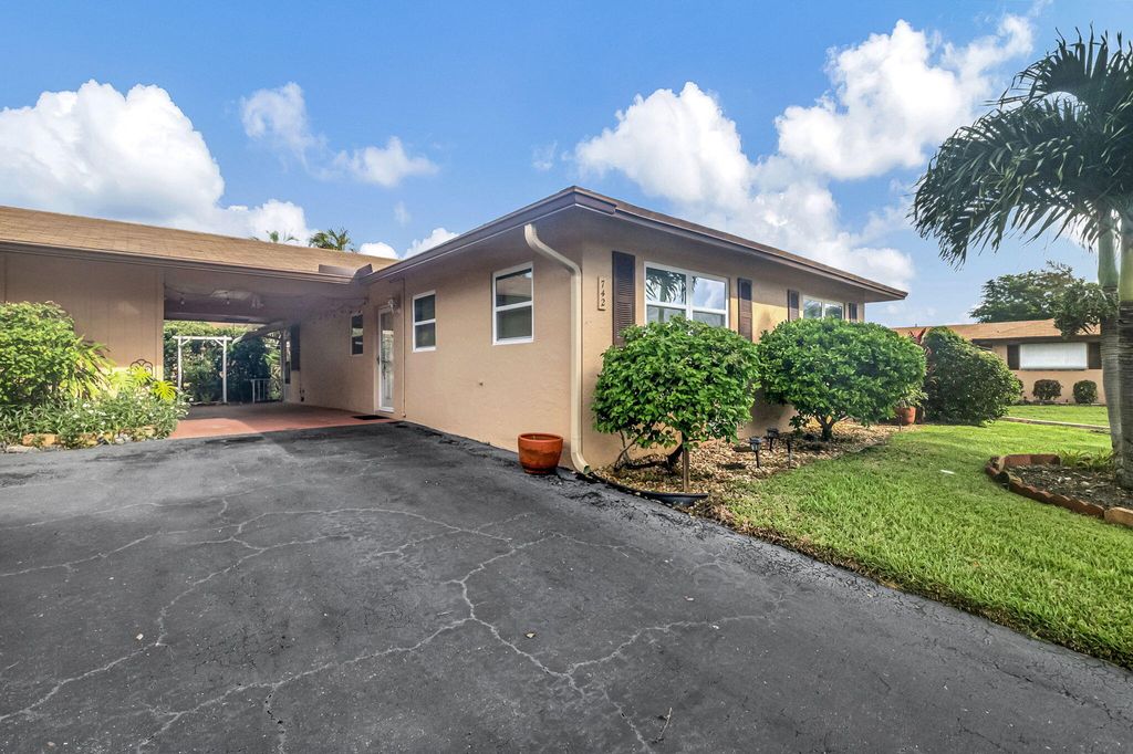 Photo of 742 Whippoorwill Lane, Delray Beach, FL 33445 (MLS # R11024125)