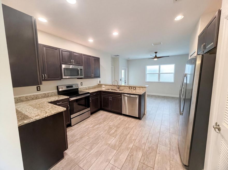 Discover stainless steel appliances throughout the kitchen at 758 NE Hawks Ridge Way. The floor plan includes all stainless steel appliances. The layout incorporates double sinks in primary bathroom. This residence features a standard build on a concrete foundation with exterior wood siding and composition shingles. The interior walls consist of painted drywall over wood framing and neutral carpet flooring.. Included 100-Day Home Warranty with buyer activation