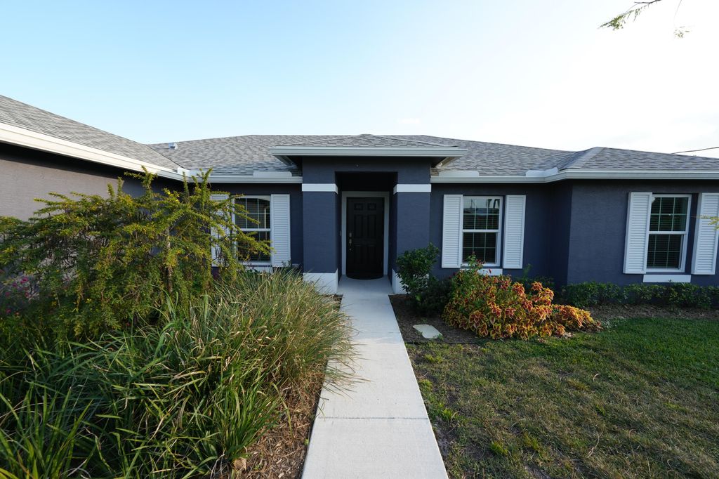 Photo of 836 SW Squirrel Avenue, Port Saint Lucie, FL 34953 (MLS # R10971740)