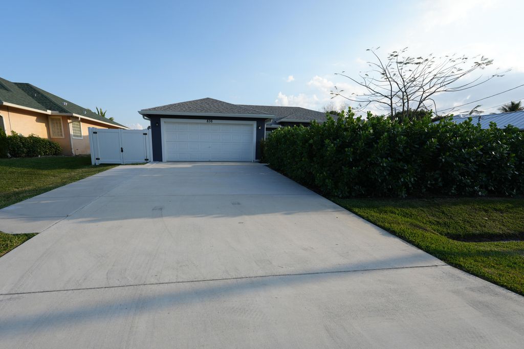 Photo of 836 SW Squirrel Avenue, Port Saint Lucie, FL 34953 (MLS # R10971740)