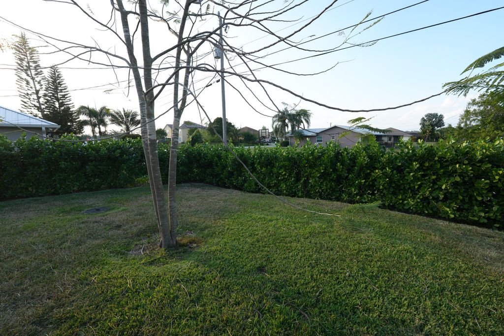 Photo of 836 SW Squirrel Avenue, Port Saint Lucie, FL 34953 (MLS # R10971740)