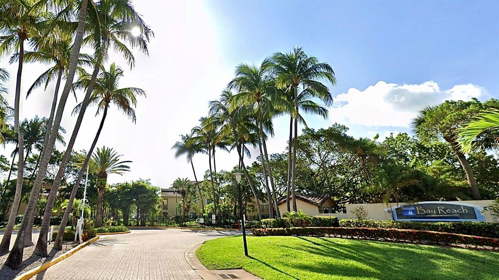 Photo of 1120 Lake Shore Drive #202, Lake Park, FL 33403 (MLS # R10930636)