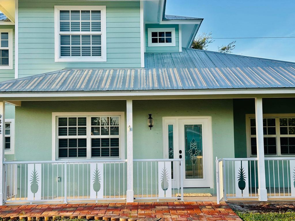 Photo of 9322 SE Athena Street, Hobe Sound, FL 33455 (MLS # B26027652)