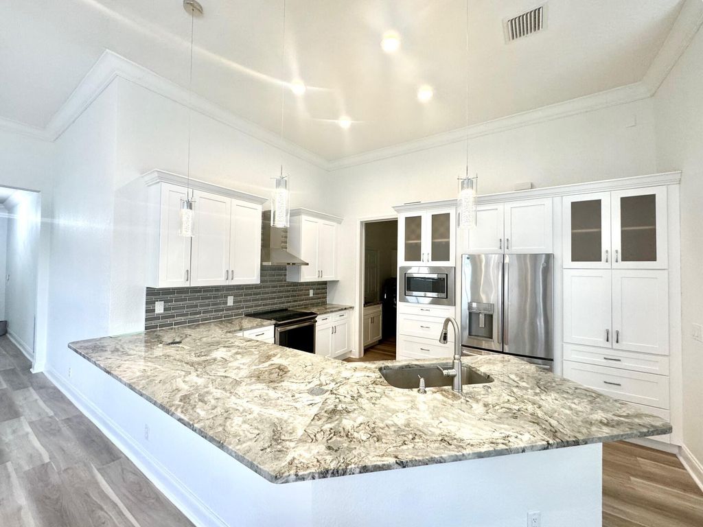 Photo of 195 Via Veracruz, Jupiter, FL 33458 (MLS # R11135921)