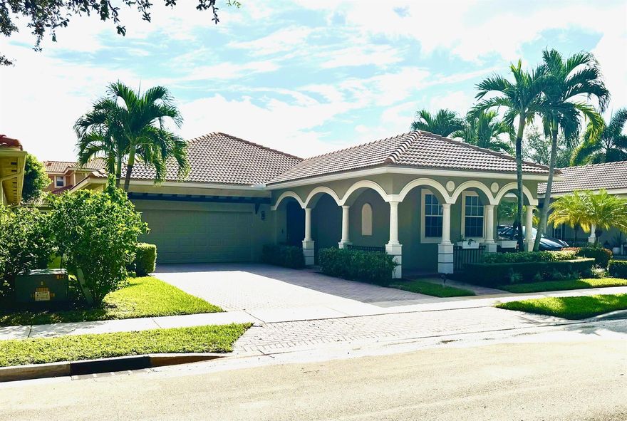 Beautiful light-filled, updated, generously sized 3-bedroom, 2-bath home in highly desired Jupiter. Split floor plan for privacy, soaring high ceilings, & fresh paint & plantation shutters throughout. Open-concept layout is perfect for everyday living & entertaining. The spacious kitchen shines with white cabinetry, stainless steel appliances, large peninsula & pendant lighting, ideal for casual dining. The primary suite offers a peaceful retreat with tray ceiling, walk-in closet, and luxurious en-suite bath complete with separate soaking tub & shower. Enjoy the grand great room, full-size washer/dryer, private backyard oasis with lush landlord-maintained landscaping-no yardwork! 2-car garage, large driveway for extra parking. Paseos resort pool, tennis, walking paths and more.