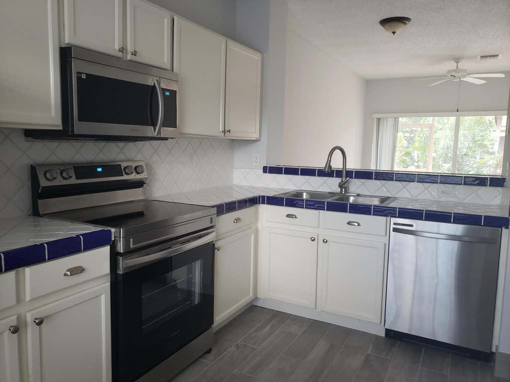 Photo of 6945 Stoney Creek Circle #6945, Lake Worth, FL 33467 (MLS # B26033015)