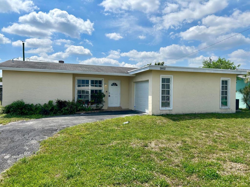 Photo of 11450 NW 35th Place, Sunrise, FL 33323 (MLS # B26007939)