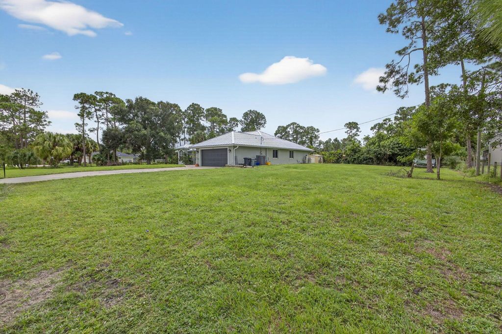 Photo of 14366 76th Road N, The Acreage, FL 33470 (MLS # R11130223)