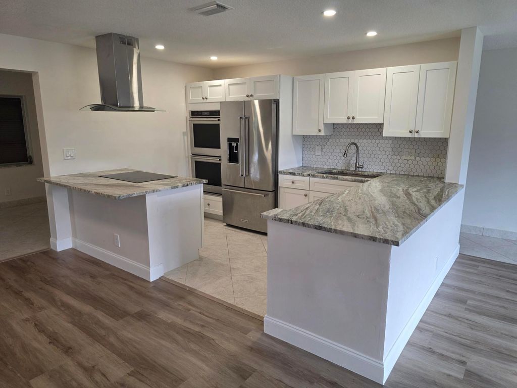 Photo of 14243 El Clavel Way, Delray Beach, FL 33484 (MLS # R11161303)