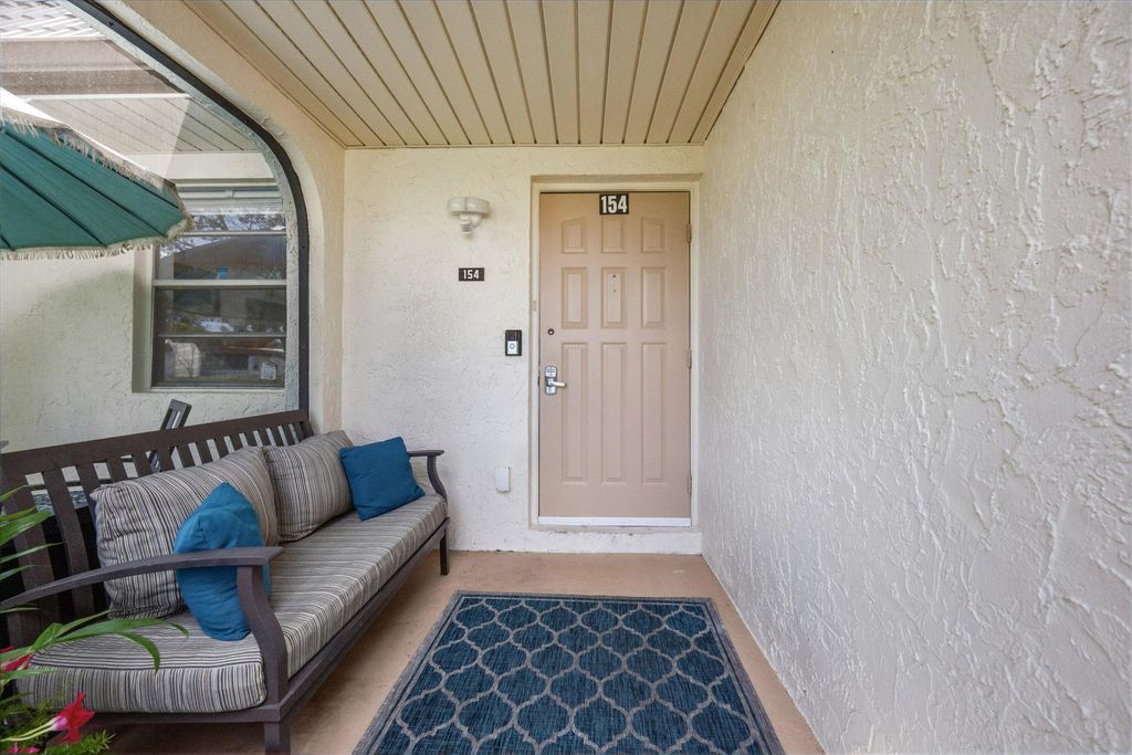 Photo of 154 Lake Rebecca Drive, West Palm Beach, FL 33411 (MLS # R11157702)