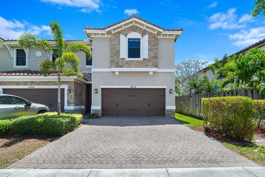 Welcome to this bright and spacious CORNER UNIT,  4-bedroom, 3.5-bath townhouse located in Town Parc at Miralago. This desirable corner home is filled with natural light and offers a well-designed layout with tile flooring throughout the main level and bathrooms, and luxury vinyl plank flooring in the bedrooms, stairways, and upstairs hallway. The kitchen features 42'' cabinets for abundant storage, granite countertops, and the custom-built closets in each bedroom add thoughtful function. Head outside to a paved east-facing patio--ideal for morning coffee or evening BBQs. Recent updates include a new dishwasher (2023) and new blinds, including motorized ones on the main level and in the primary bedroom (2024).