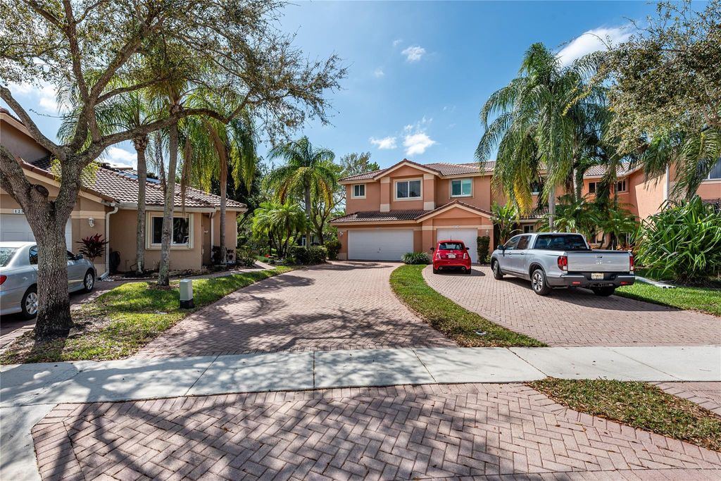 Photo of 5704 NW 127th Terrace, Coral Springs, FL 33076 (MLS # B26019087)