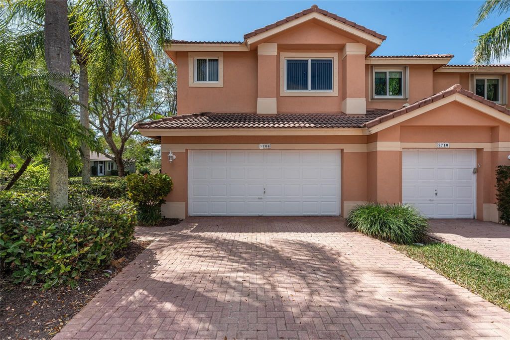 Photo of 5704 NW 127th Terrace, Coral Springs, FL 33076 (MLS # B26019087)
