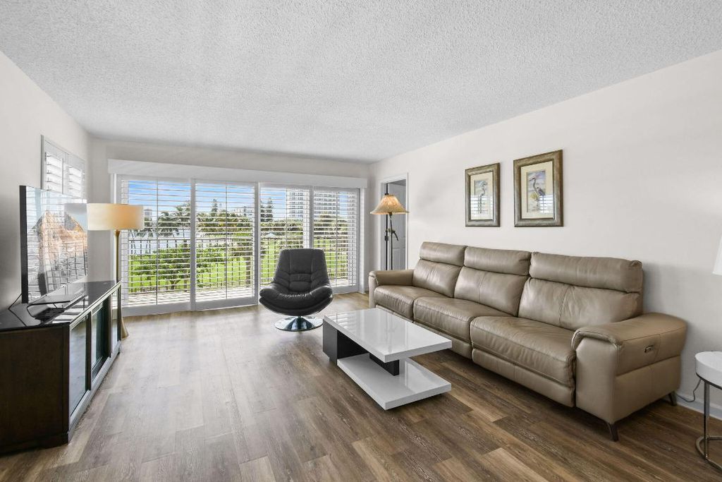 Photo of 801 Lake Shore Drive #310, Lake Park, FL 33403 (MLS # R11129136)