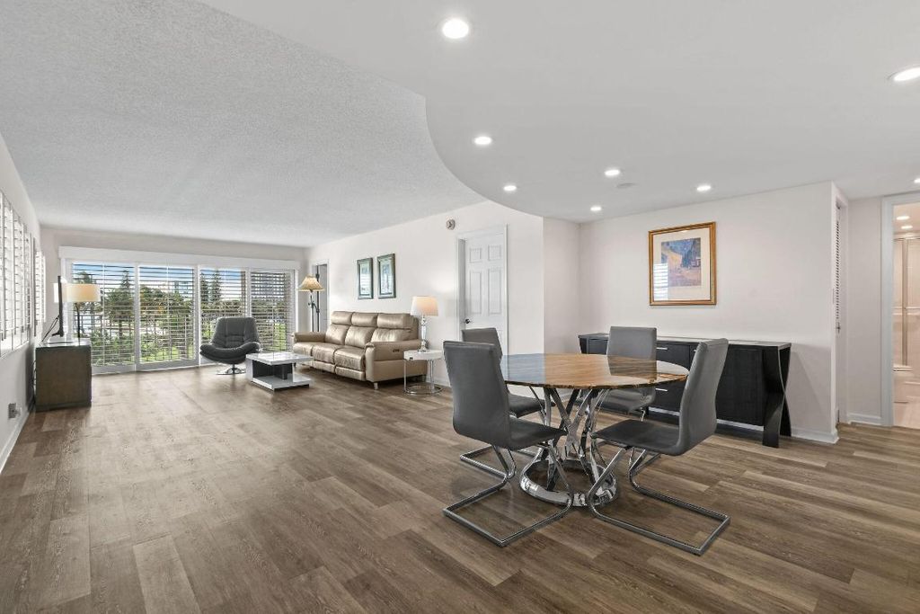 Photo of 801 Lake Shore Drive #310, Lake Park, FL 33403 (MLS # R11129136)