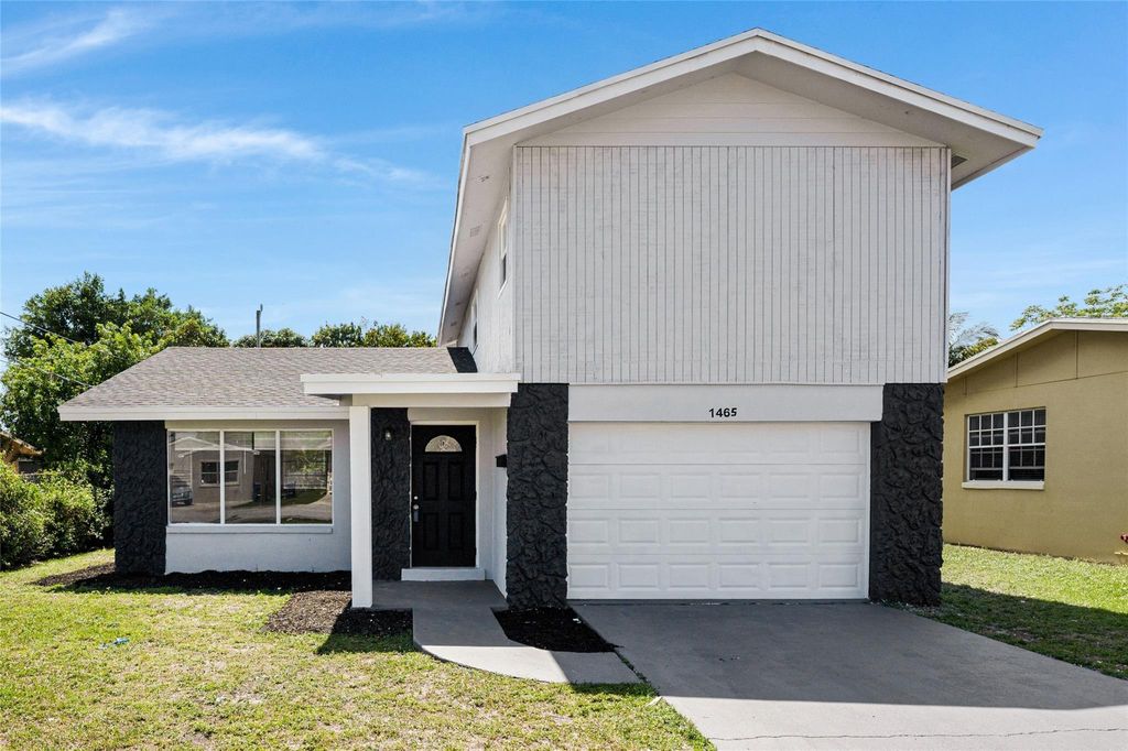 Photo of 1465 W 34th St, Riviera Beach, FL 33404 (MLS # F10430409)