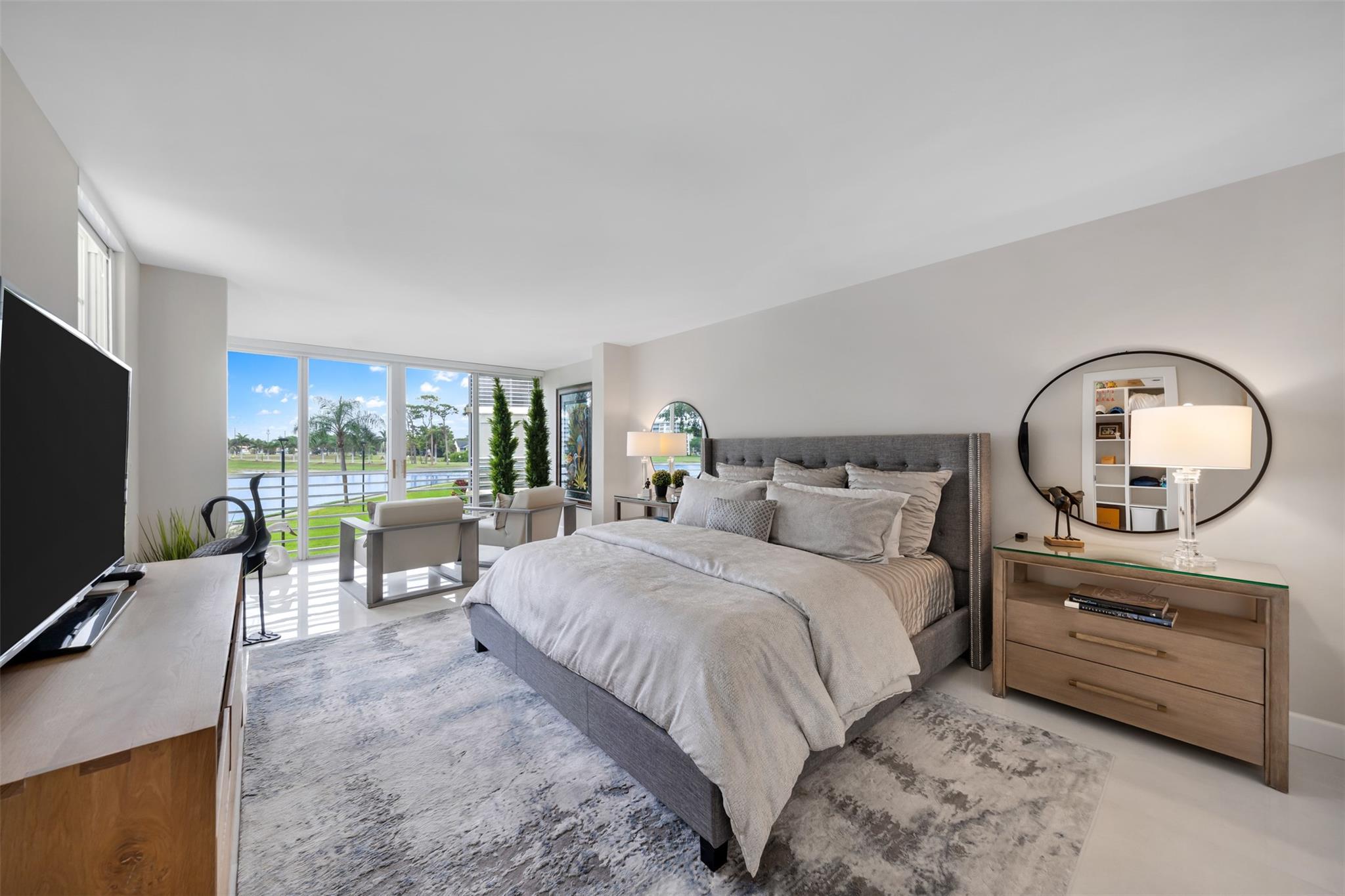 Highly sought-after KING model the largest and most desirable floor plan in Palm Aire! This unit is not for just any buyer, but for someone with refined taste and appreciation for quality. Fully remodeled with top-of-the-line finishes and meticulous attention to detail by its owners as their personal Florida home. Full Size W/D. The kitchen was completely redesigned from its original layout to maximize space and elegance. Located in one of the most exclusive and financially solid buildings in Palm Aire no special assessments and all inspections passed. Unique building with its own property management and a private pool for residents only. Impact windows, and ready to move in. Perfect for buyers seeking luxury, comfort, and peace of mind. Turn the key and enjoying the Florida lifestyle.