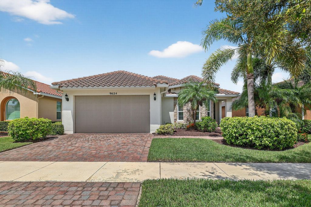 Photo of 9624 SW Royal Poinciana Drive, Port Saint Lucie, FL 34987 (MLS # B26024292)