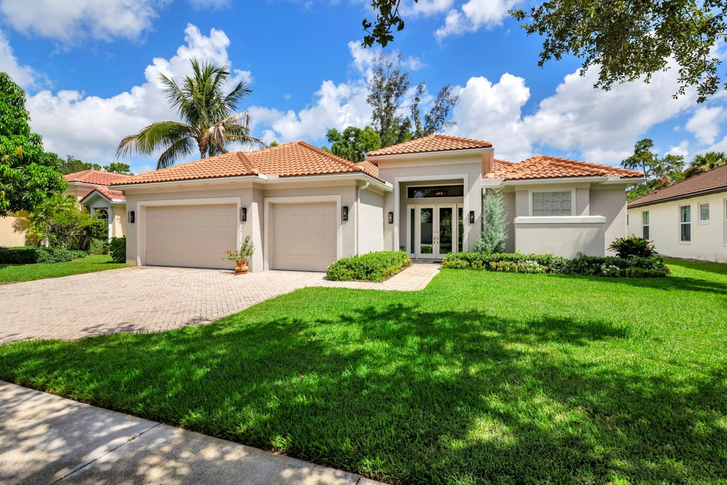 Photo of 1754 Flagler Manor Circle, West Palm Beach, FL 33411 (MLS # B26063676)