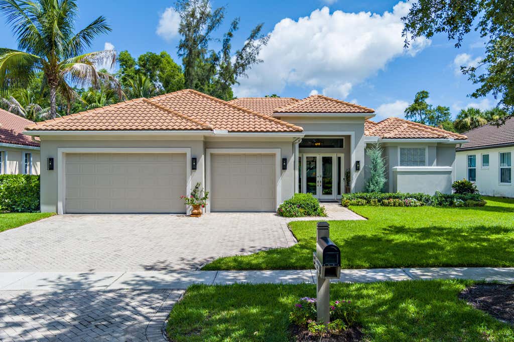 Photo of 1754 Flagler Manor Circle, West Palm Beach, FL 33411 (MLS # B26063676)