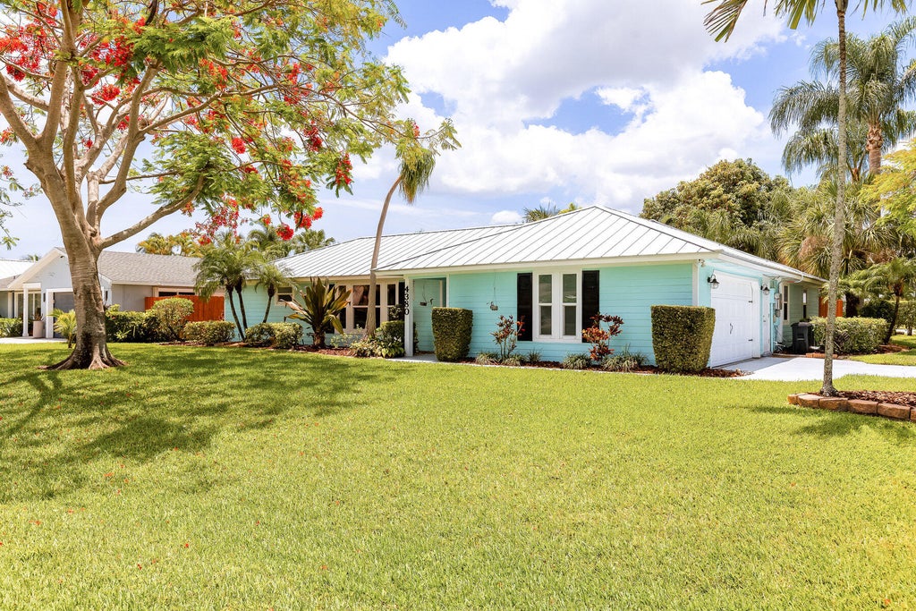 Photo of 4380 Butternut Street, Palm Beach Gardens, FL 33410 (MLS # R11096953)