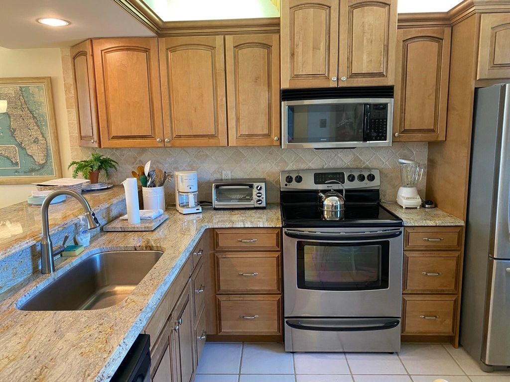 Photo of 401 S Seas Drive #203, Jupiter, FL 33477 (MLS # R11119935)
