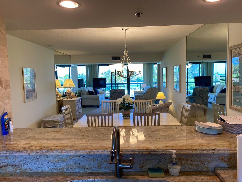Photo of 401 S Seas Drive #203, Jupiter, FL 33477 (MLS # R11119935)