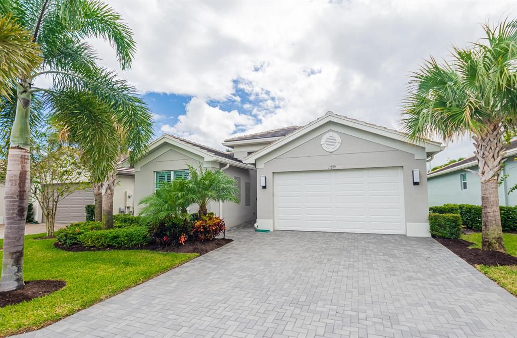 Photo of 11699 SW Hawkins Terrace, Port Saint Lucie, FL 34987 (MLS # R10874112)