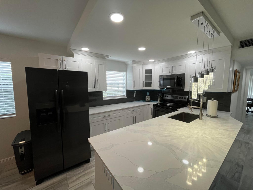 Photo of 256 Monaco F, Delray Beach, FL 33446 (MLS # R11141615)