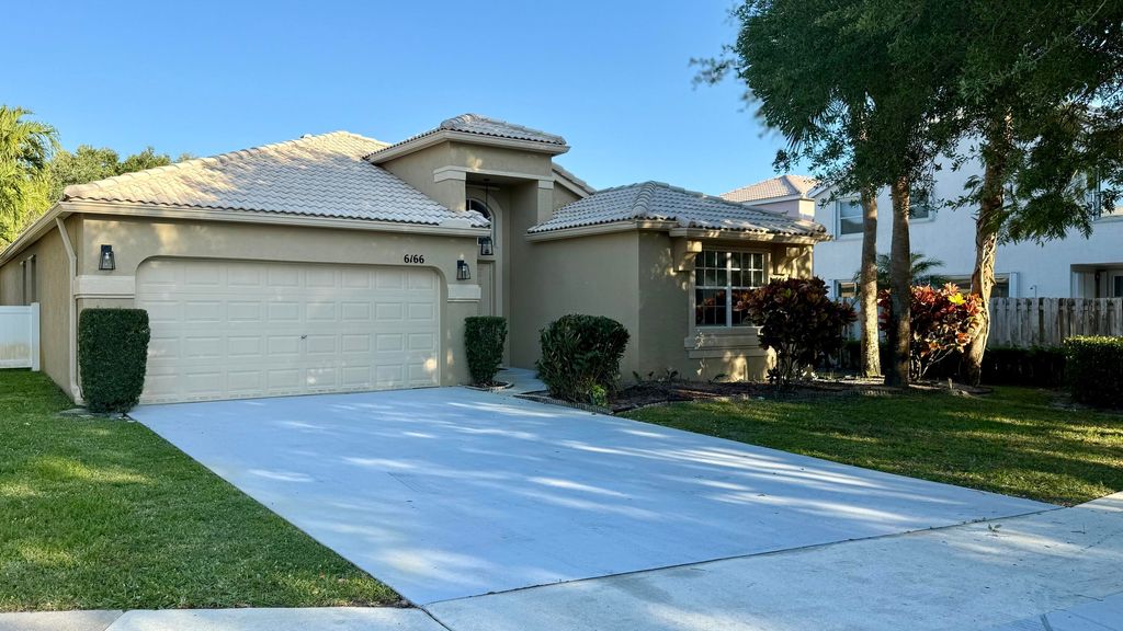 Photo of 6166 Cotton Rose Lane, Lake Worth, FL 33467 (MLS # R11169560)