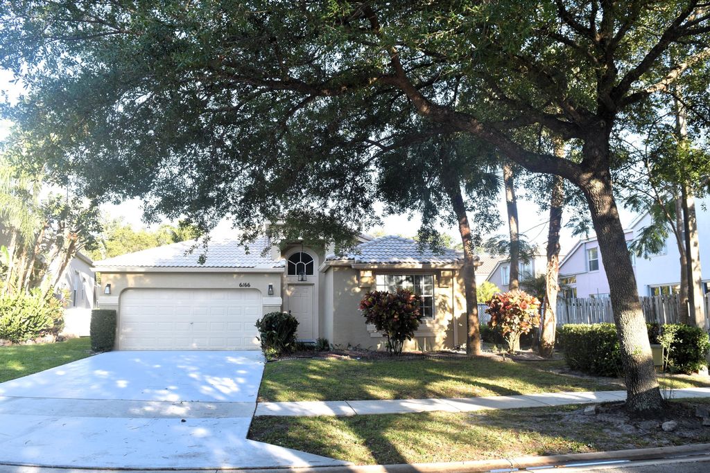 Photo of 6166 Cotton Rose Lane, Lake Worth, FL 33467 (MLS # R11169560)