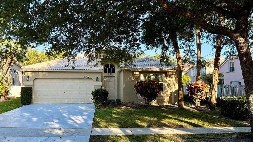 Photo of 6166 Cotton Rose Lane, Lake Worth, FL 33467 (MLS # R11169560)