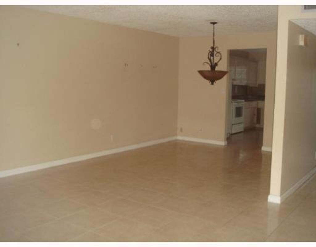 Photo of 3920 Woodside Drive #3, Coral Springs, FL 33065 (MLS # F10509201)