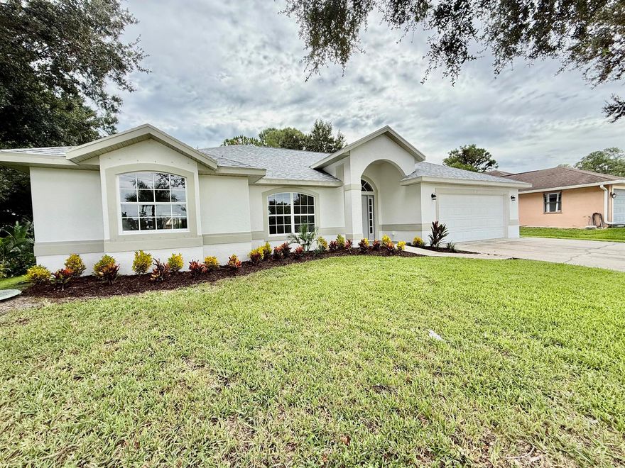 Welcome to this Beautifully updated Port St. Lucie home with a brand-new roof, luxury vinyl plank flooring, and open-concept living. Enjoy cooking in your fully renovated kitchen, then step out back to relax under the trussed, screened-in porch or take a dip in the private pool--all overlooking a peaceful canal. The split floor plan offers privacy and functionality, ideal for families or entertaining guests. Located just minutes from Tradition, I-95, shopping, dining, and top-rated schools. This move-in ready home combines modern upgrades with an unbeatable location. Schedule your private showing today--this gem won't last long!