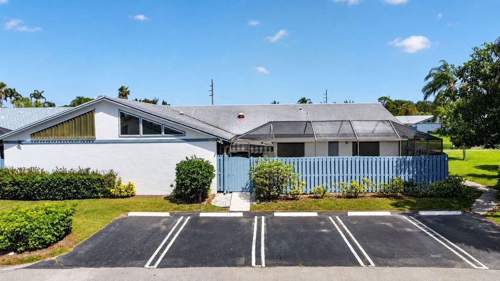 Photo of 1604 Timberlane Circle, Greenacres, FL 33463 (MLS # B26032230)