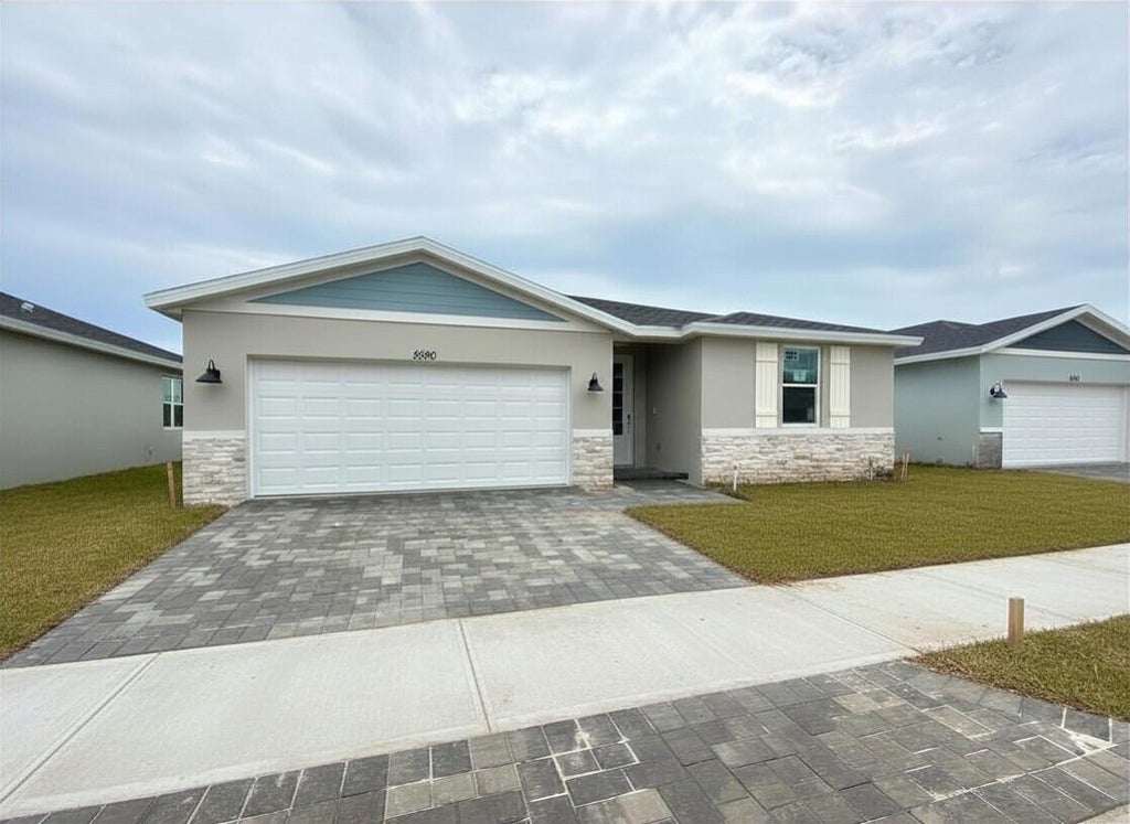 Photo of 5590 HAMPTON PARK Circle, Vero Beach, FL 32966 (MLS # B26082886)