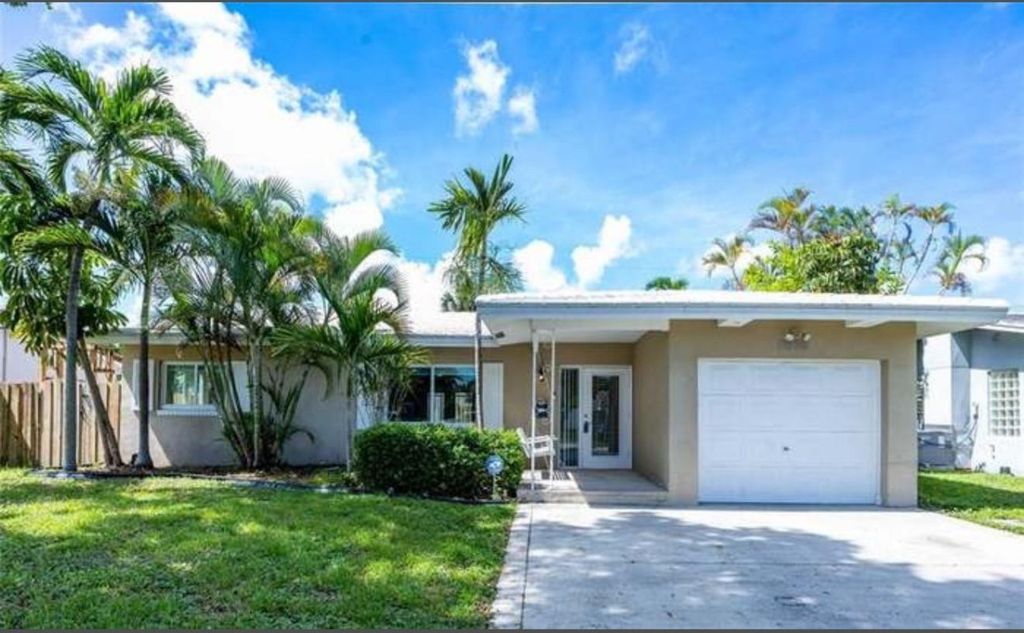 Photo of 2025 NW 38th Street, Oakland Park, FL 33309 (MLS # F10526500)