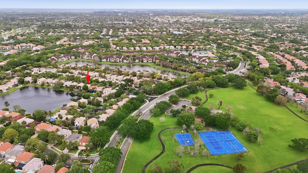 Photo of 10690 NW 12th Drive, Plantation, FL 33322 (MLS # B26008103)