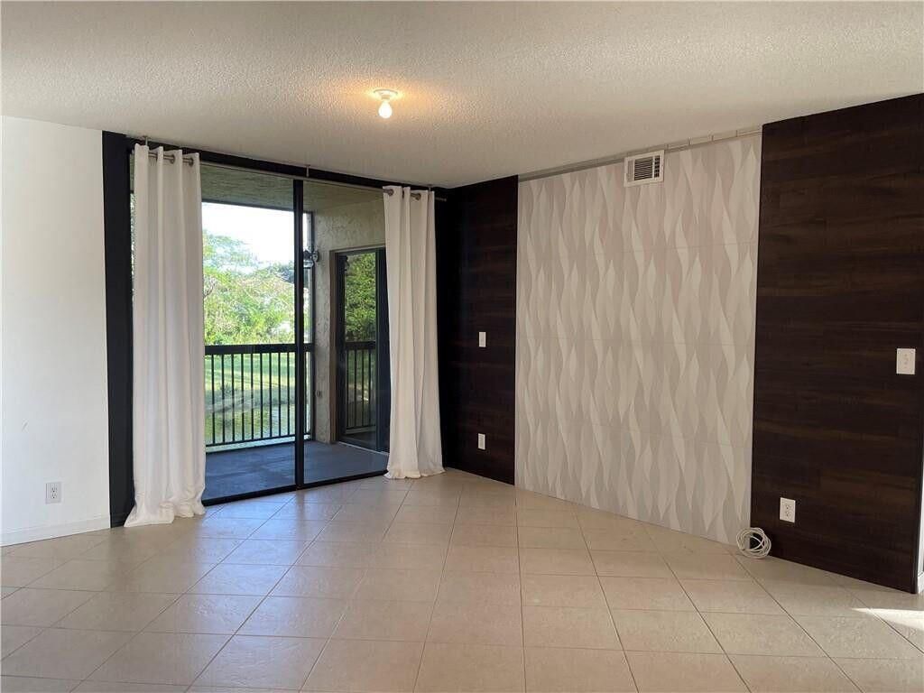 Photo of 5701 Riverside Drive #206b6, Coral Springs, FL 33067 (MLS # R11079088)