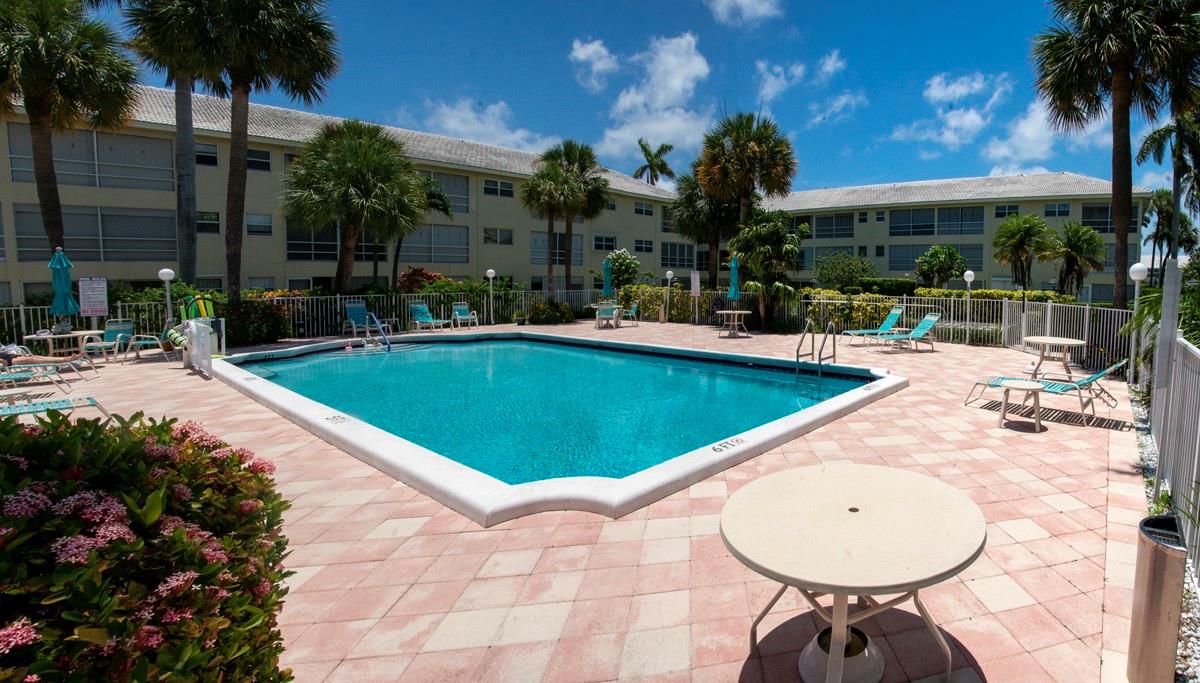 Highly Motivated Seller!! Spacious 2 bedroom 2 bath top floor unit with a private screen enclosed balcony. Great for a winter get away or your year round home. Plus a super Lighthouse Point location too! Situated in an active 55+ lifestyle community, this home offers both comfort and convenience. Residents enjoy access to a well-appointed clubhouse and a sparkling pool—perfect for relaxation and socializing. The community’s prime location in Lighthouse Point provides easy access to local amenities, making everyday living simple and enjoyable.