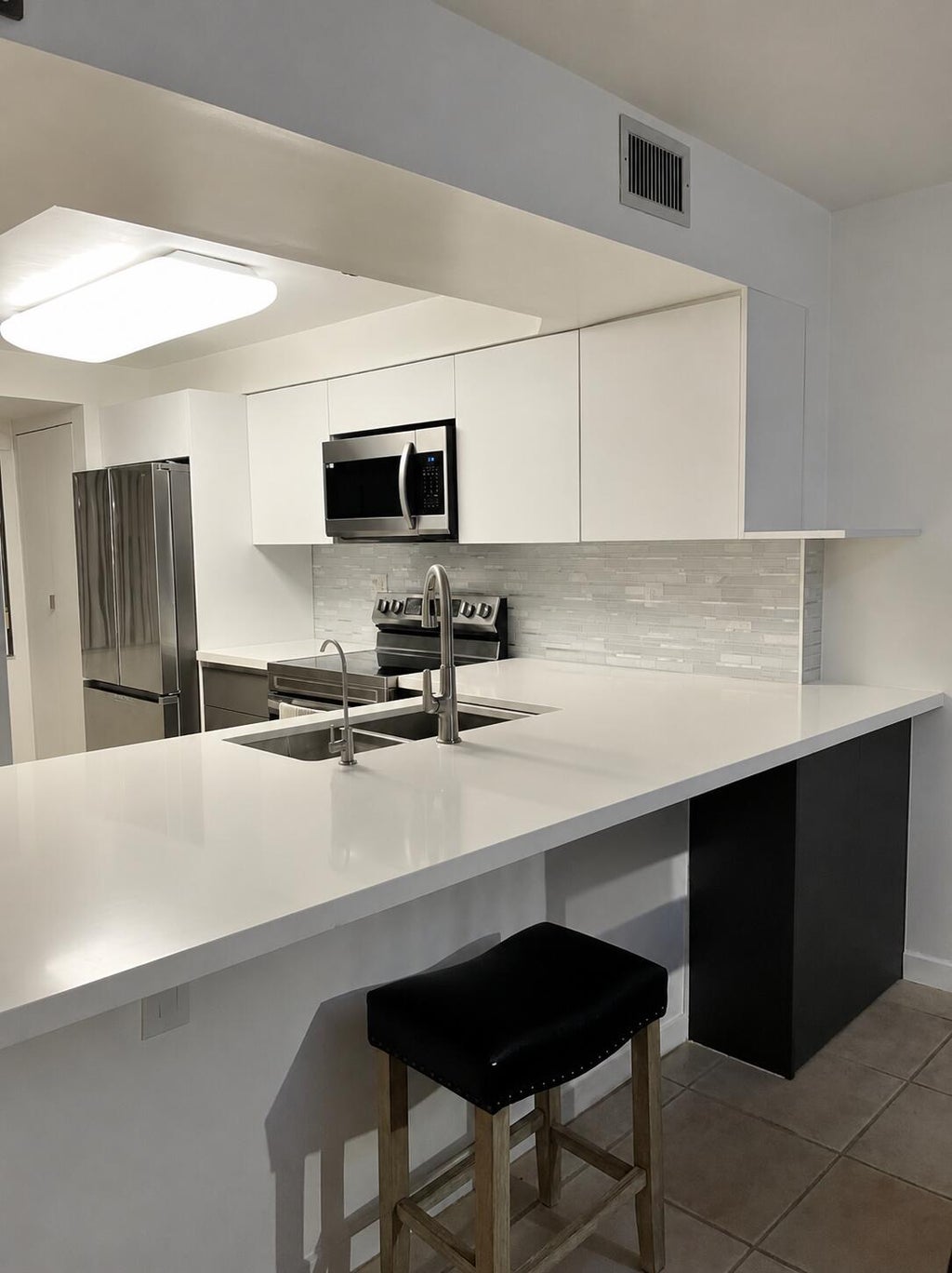 Photo of 450 Commodore Drive #106, Plantation, FL 33325 (MLS # B26067541)